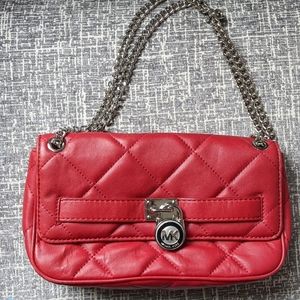 Red quilted Michael Kors handbag